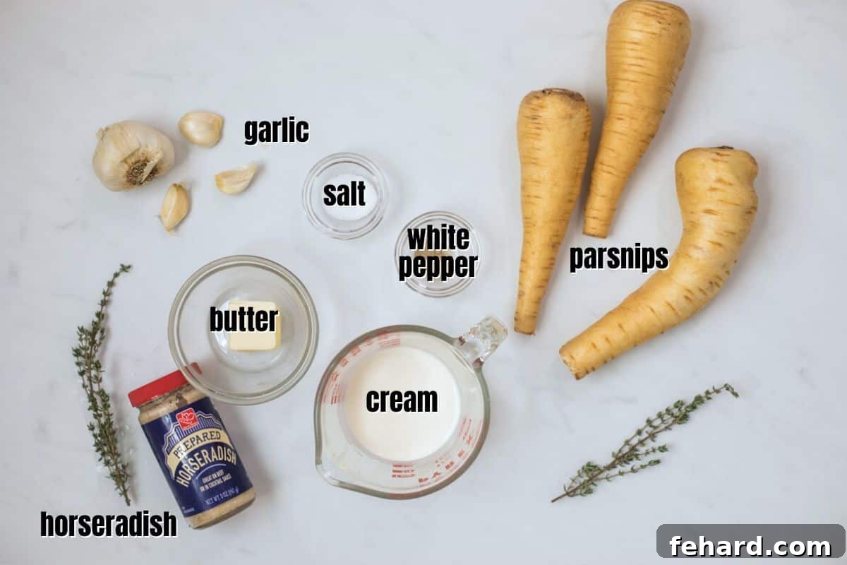 Parsnip Puree Recipe Ingredients A flat lay photograph showcasing all the ingredients required for parsnip puree: parsnips, heavy cream, prepared horseradish, unsalted butter, garlic cloves, kosher salt, and white pepper.