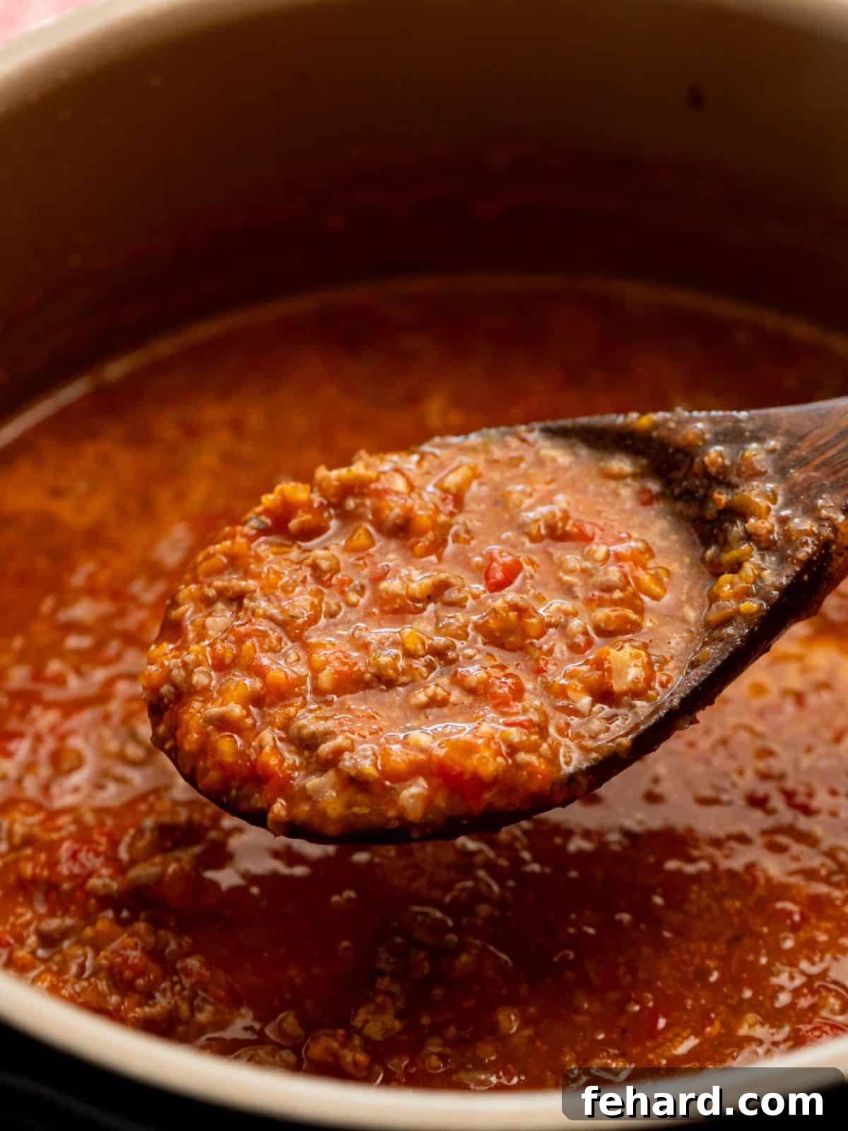 Instant Pot Bolognese Instant Pot Bolognese sauce made with pancetta, beef, and sausage being ladled out of Instant Pot. A rich, indulgent Italian meat sauce, perfect for quick and easy weeknight meals or special occasions.