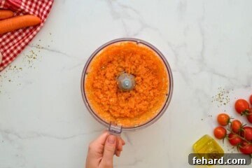 Rich & Rapid Instant Pot Bolognese 3 Mini food processor with ingredients for sofrito pulsed together for Instant Pot Bolognese.