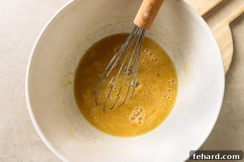 wet ingredients in a white bowl