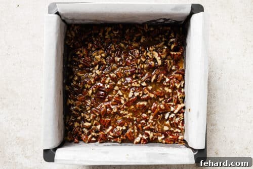 Irresistible Gluten-Free Pecan Bars 15 pecan pie bars filling poured over crust