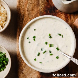 overhead view of horseradish sauce in a white bowl.