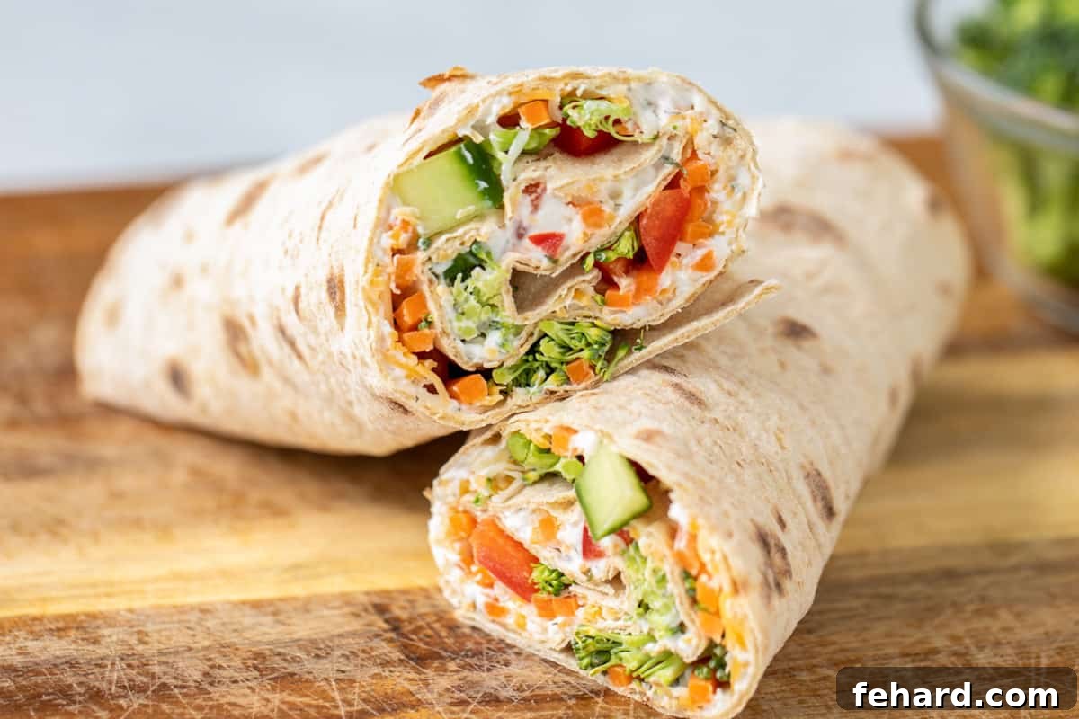 Veggie Wrap Serving Ideas Sliced veggie wraps arranged beautifully on a plate, ready to be served as an appetizer.