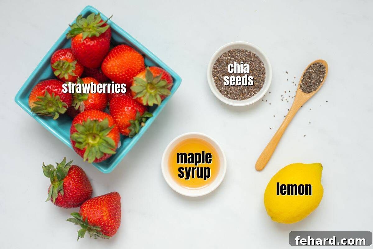 Strawberries, chia seeds, maple syrup, and a lemon on counter labeled for making homemade strawberry chia jam.