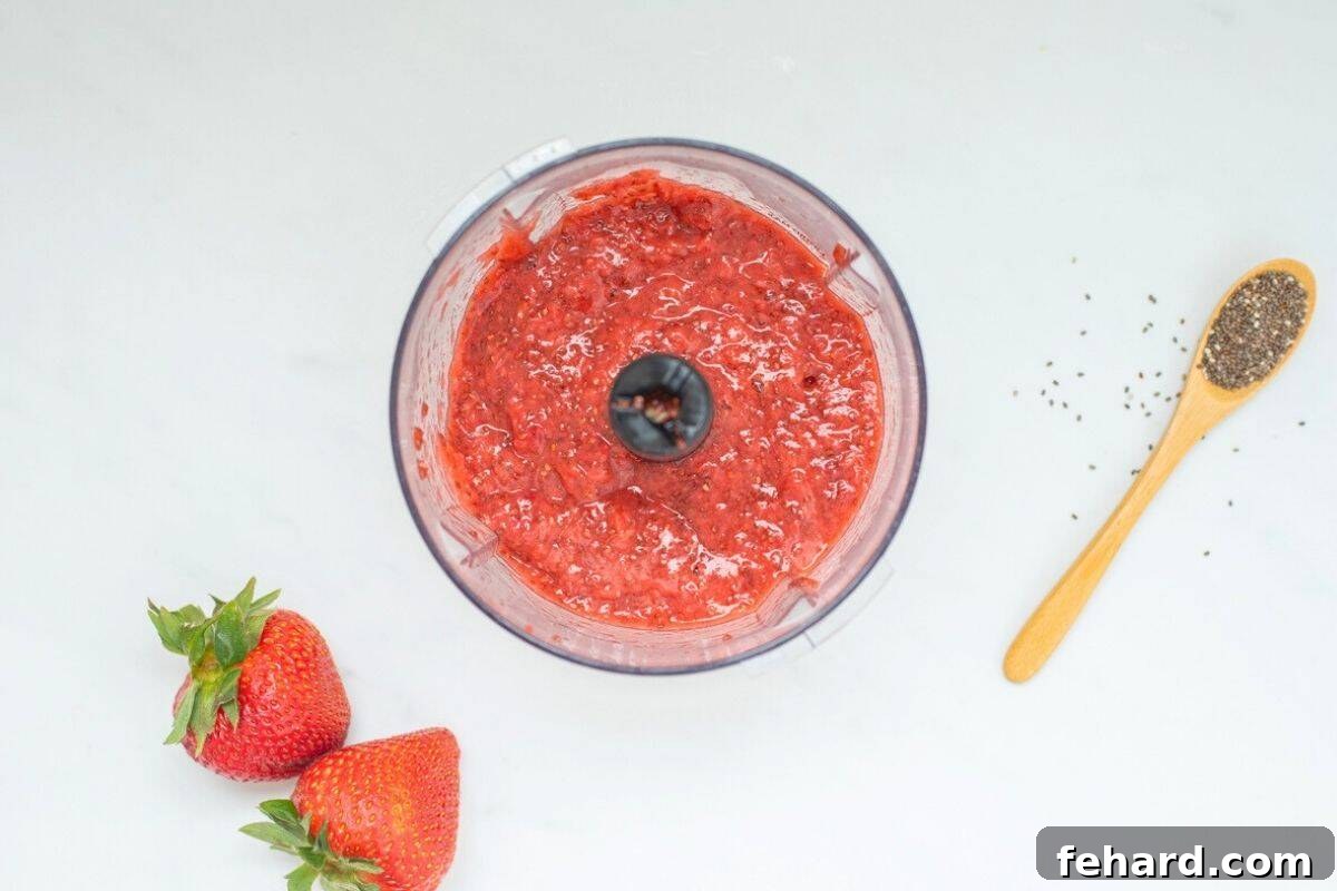 Blended chia jam in small food processor.