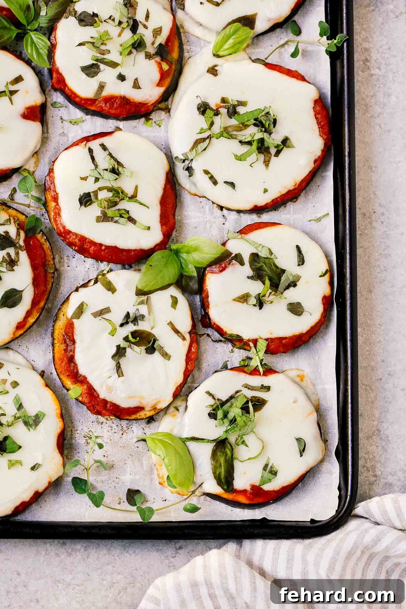 Mini Eggplant Pizzas 2 overhead view of eggplant pizza on a baking sheet