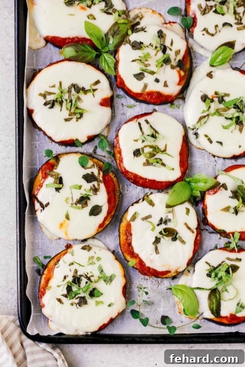 Mini Eggplant Pizzas 12 overhead view of eggplant pizza on a baking sheet