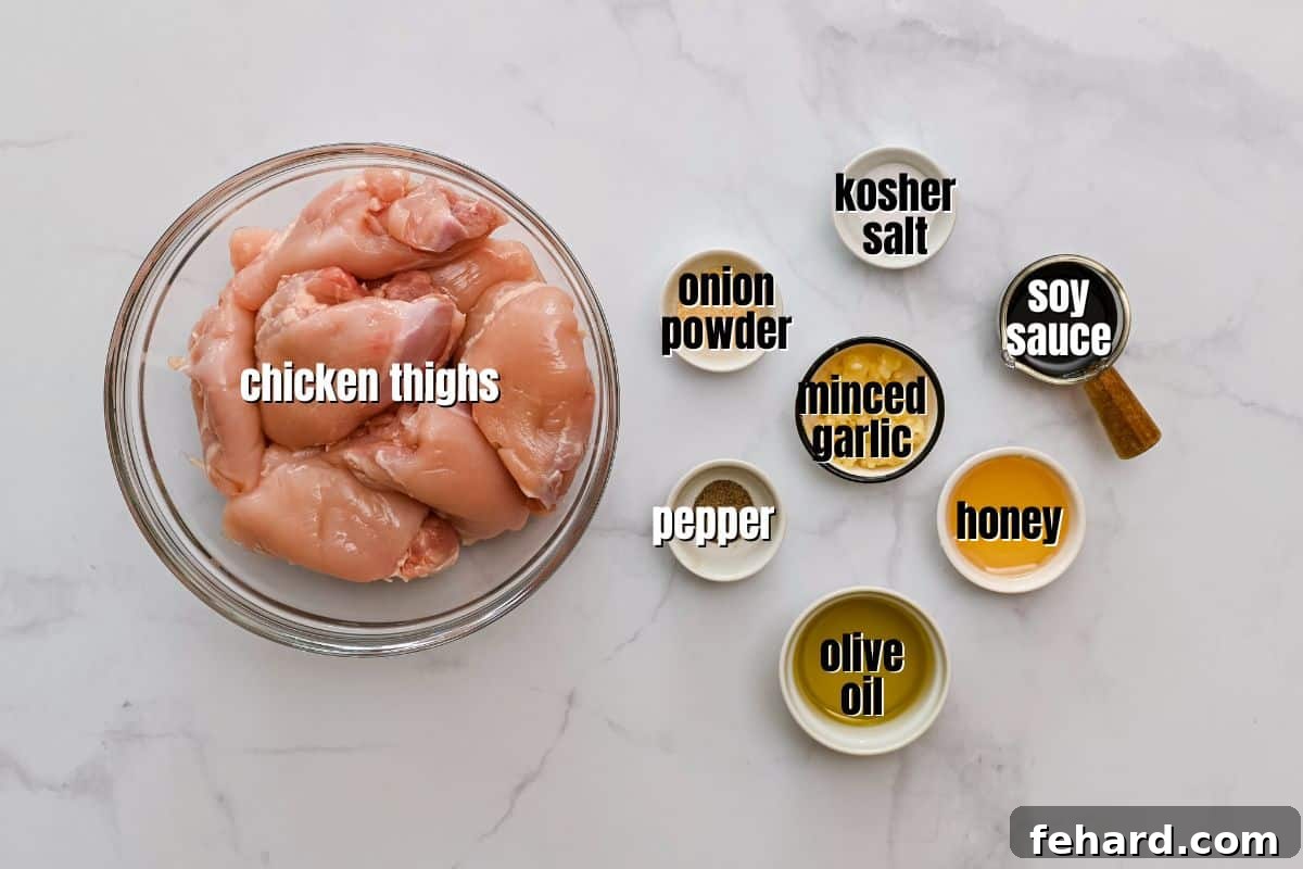 Ingredients for honey soy chicken thigh marinade and chicken thighs laid out on a kitchen counter, clearly labeled for convenience.