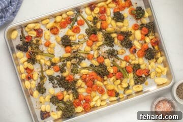 Roasted gnocchi, broccolini, and grape tomatoes tossed with olive oil garlic powder, red pepper flakes, and oregano.