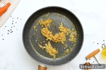 Sauteed Onions in Skillet for slow cooker beef stew.