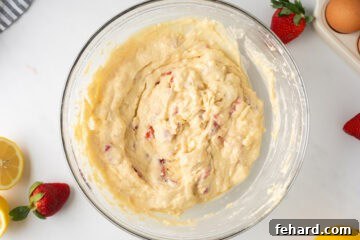 Batter for strawberry quick bread in large mixing bowl.