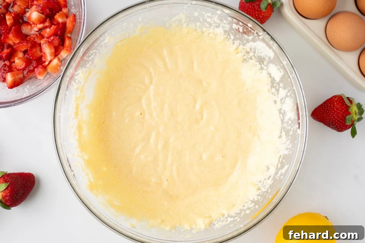 Butter, sugar, yogurt, and eggs creamed together in large mixing bowl.