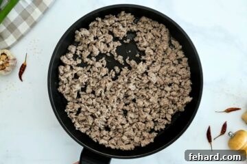 Egg Roll Medley Bowl 4 Browned ground turkey in skillet for base of egg roll bowl.