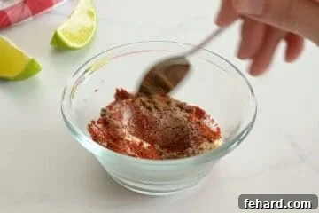 Spices for homemade fajita seasoning mixed together in small bowl.