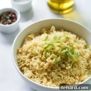 A square image showing a bowl of fluffy rice for the recipe card.