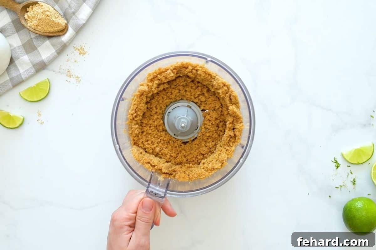 No Bake Key Lime Pie with Graham Cracker Crust Graham cracker crumbs, melted butter, and salt processed to resemble wet sand in food processor.