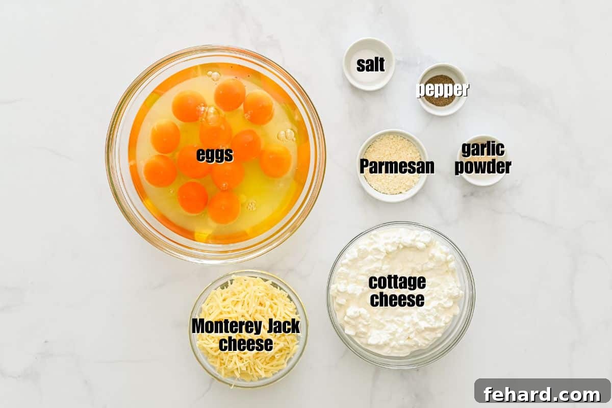 Egg Bake with Cottage Cheese Eggs, cottage cheese, Parmesan, salt, pepper, and garlic powder laid out in bowls on counter.