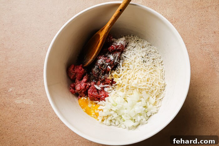 Ingredients in a bowl for making meatballs.